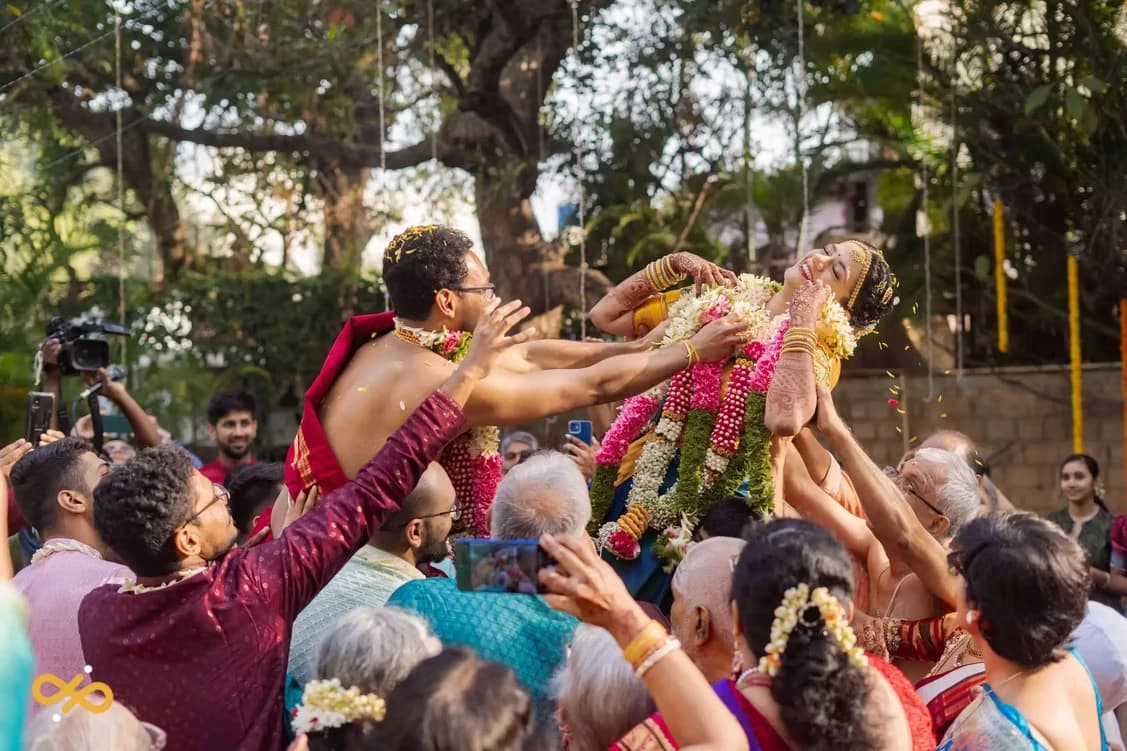 Lifting the bride in celebration
